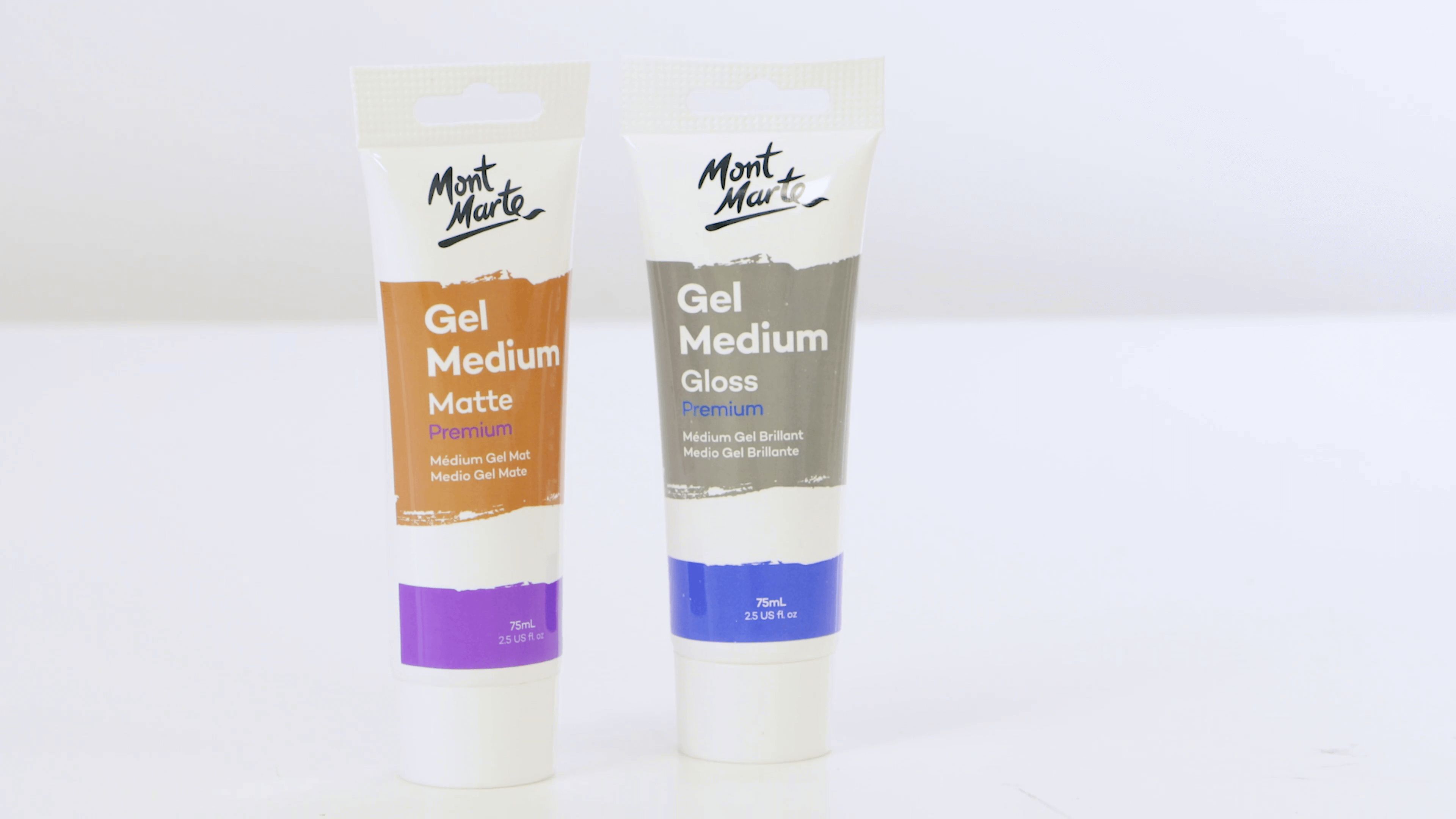 Two tubes of Mont Marte gel medium in gloss and matte side by side.