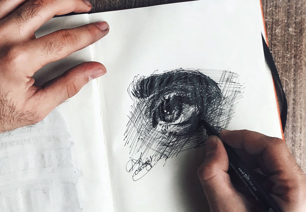 Hand drawing a realistic eye.