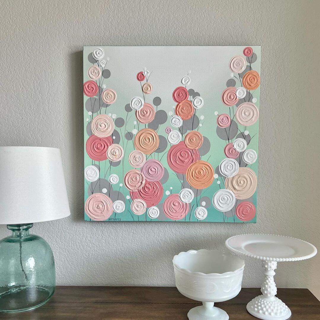 3. Mint green painting with peach, white, coral and pink swirls of flowers on top.