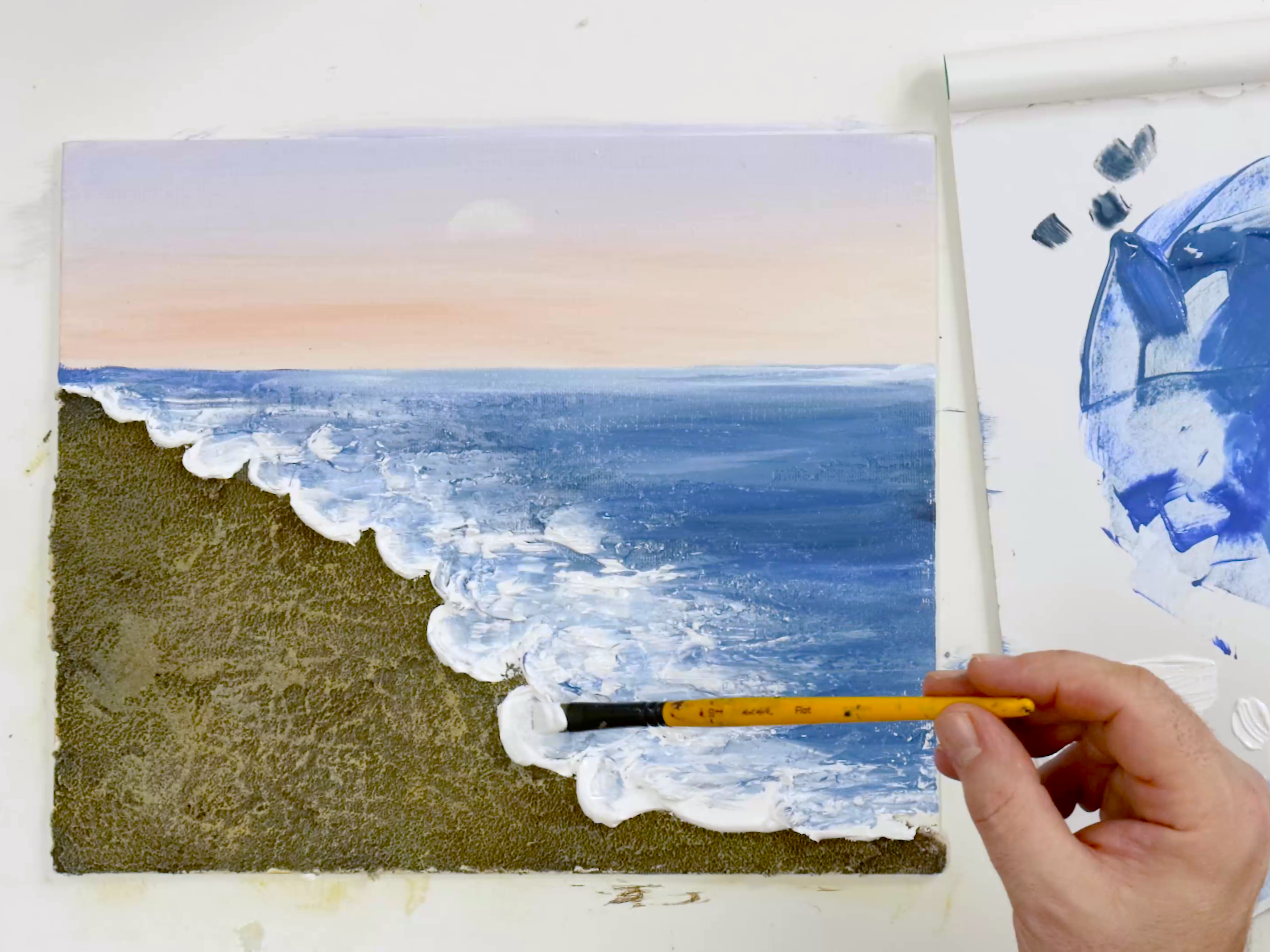 3. Sand texture beach painting with white paint being added