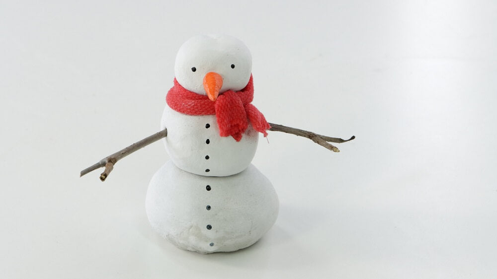 Snowman made from air dry clay.