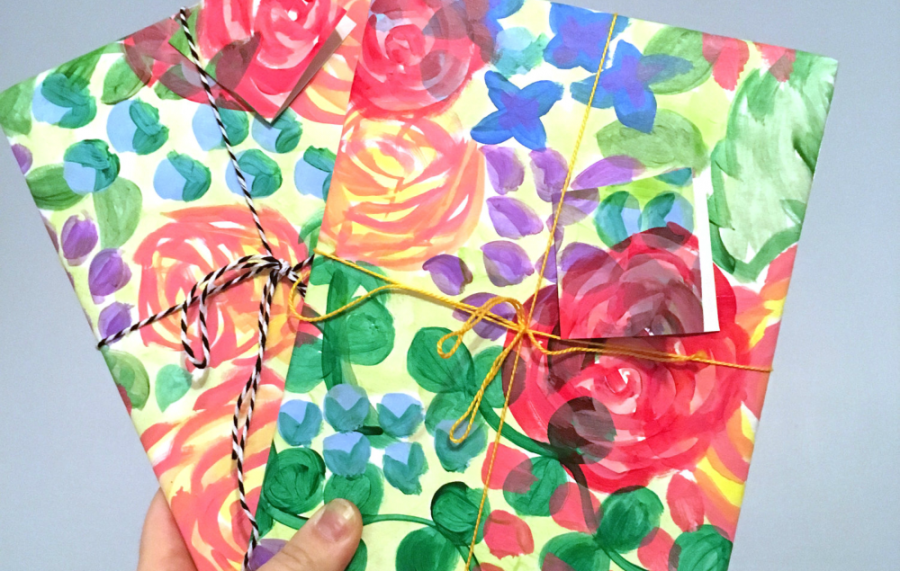 Coloured, floral wrapping paper, wrapped on presents with string.