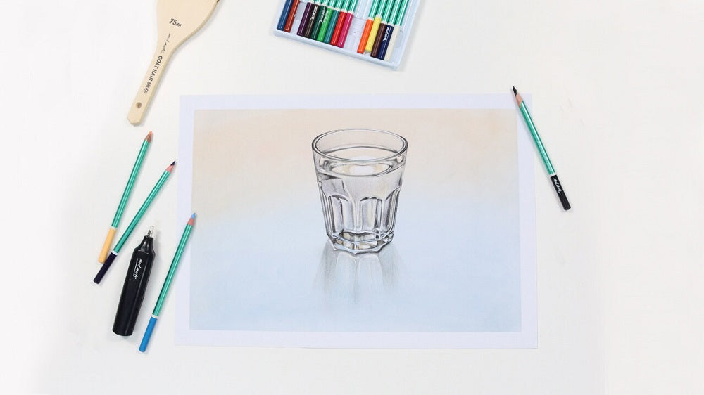 A realistic drawing of a glass with pastel pencils and a watercolour brush next to it.