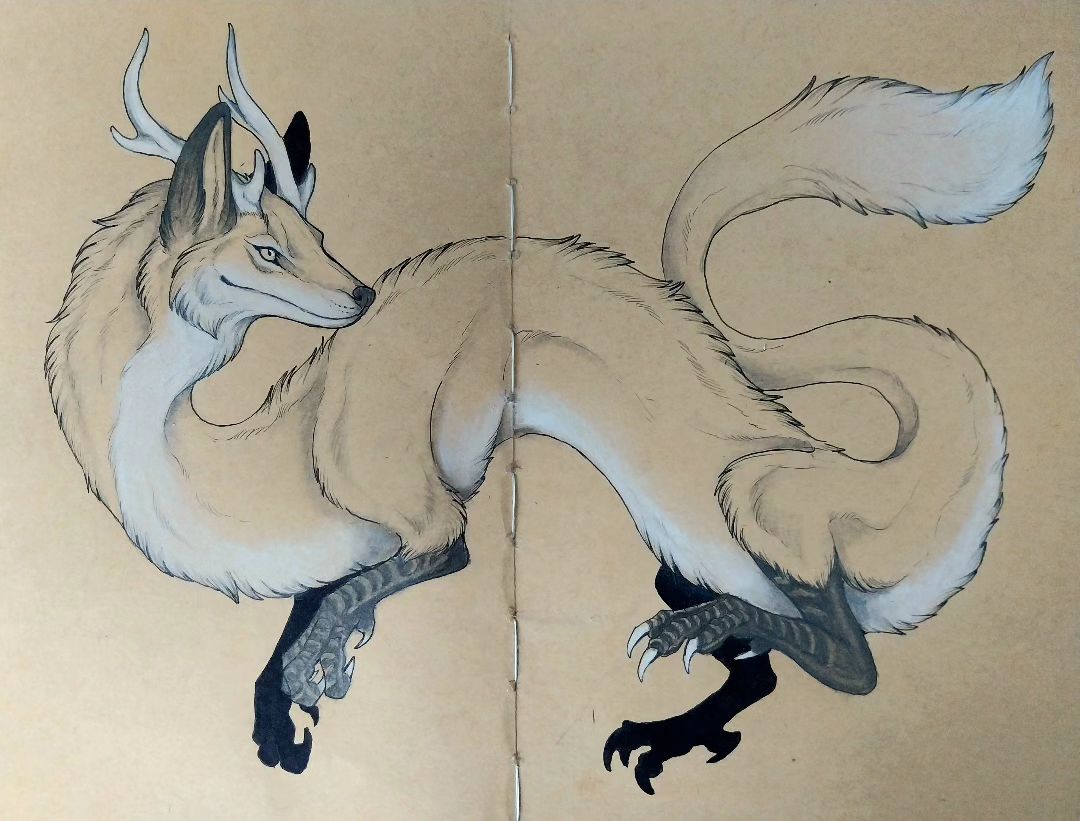 6. @maahismaaria drawing of a dragon with a fox head and body