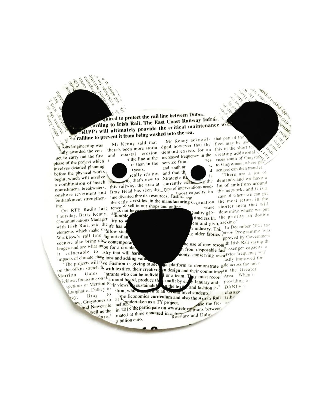 6. @wearethebusybees polar bear head made from cut newspaper and craft paper