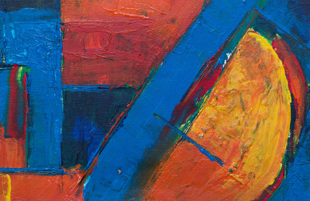 Close up of blue, red, orange and yellow painting. 