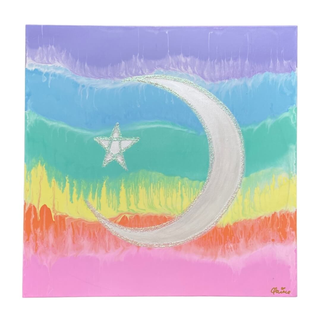 7. A rainbow painted canvas with a silver cresent moon and star painted on top.