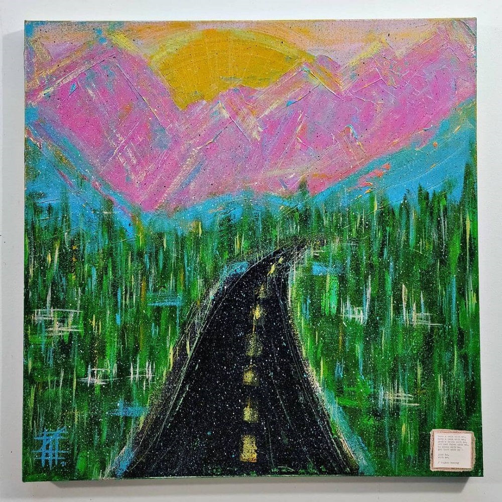 Colourful artwork of a road leading to pink mountains.