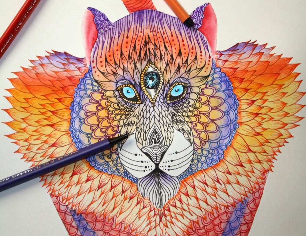 Mandala style tiger drawn in coloured pencils and fineliners.