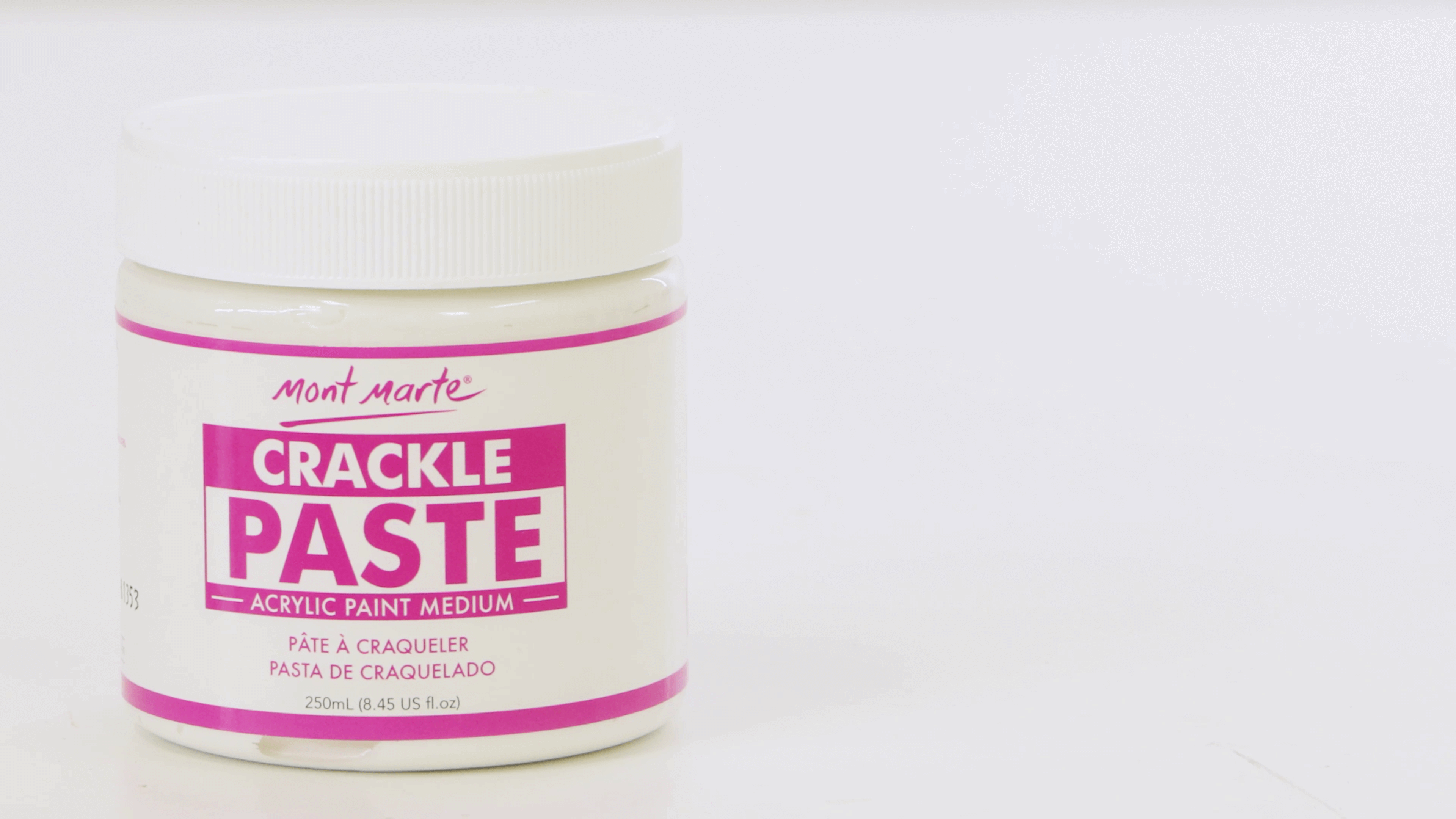 A tub of Mont Marte crackle paste with a white background behind.