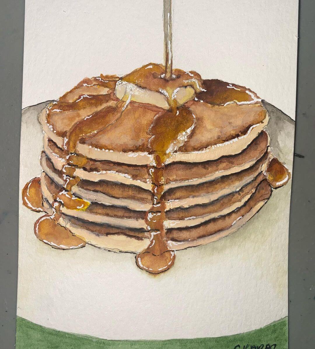 Realistic drawing of a stack of pancakes with butter on top, then coloured with watercolour.