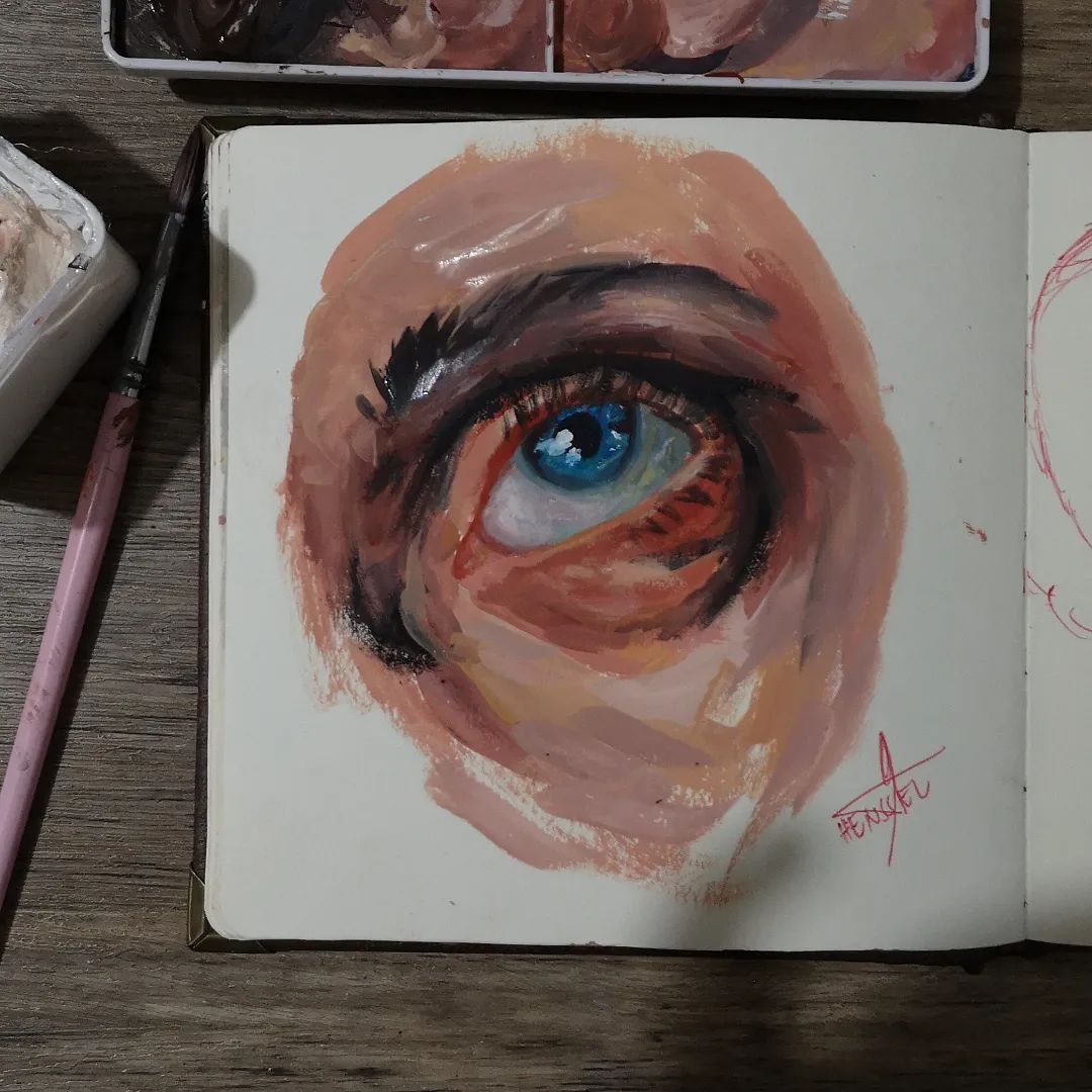 8. @hinsilsart gouache painting of a blue eye looking upwards towards a painted eyebrow on the page of a visual journal