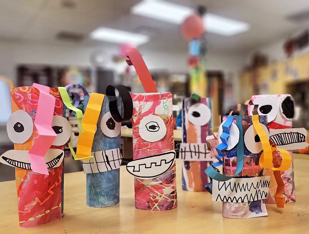 8. @rainbow.heart.artroom cylindrical paper craft monsters with colourful decorations