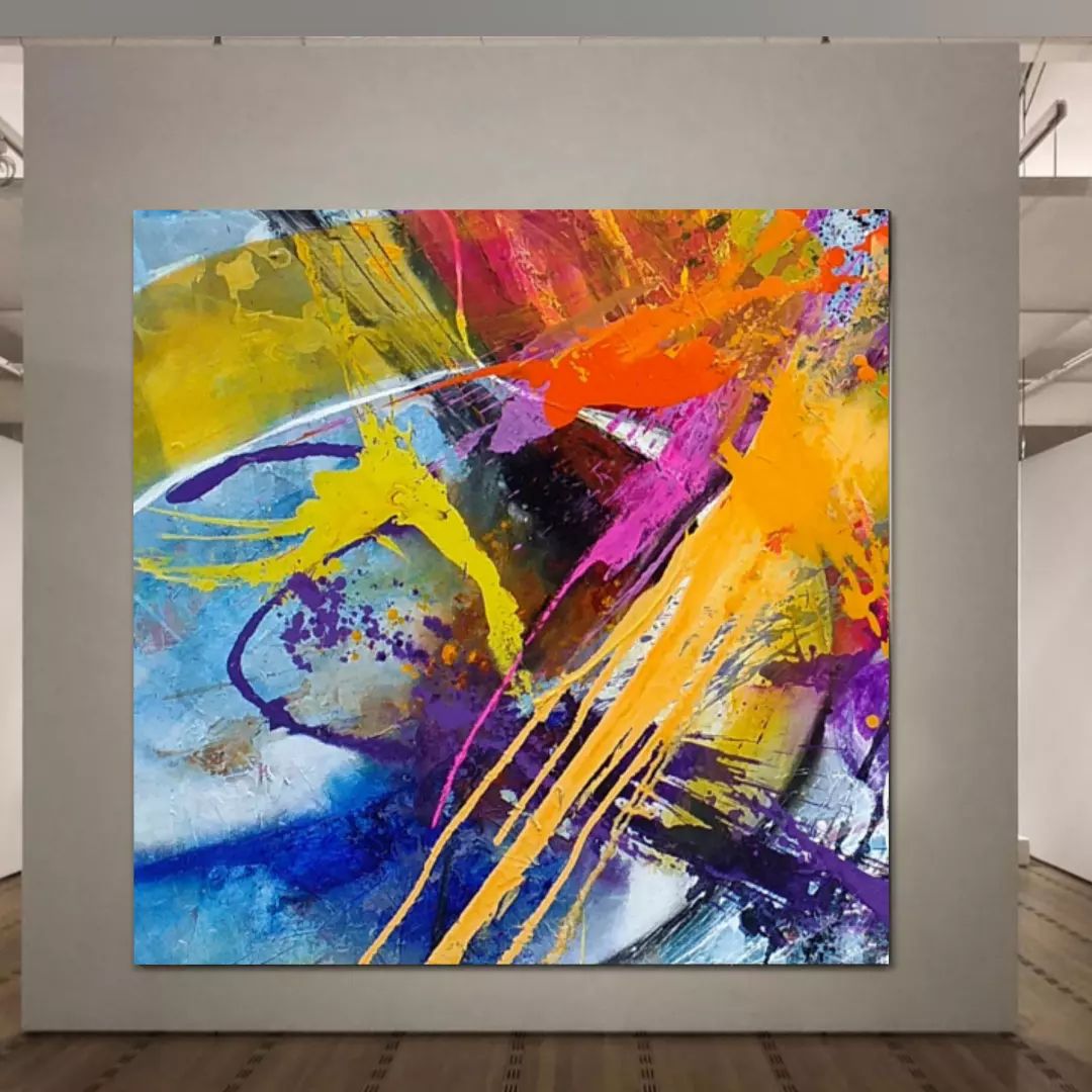 8. @studiodelionn large rainbow coloured action painting canvas hung on a wall