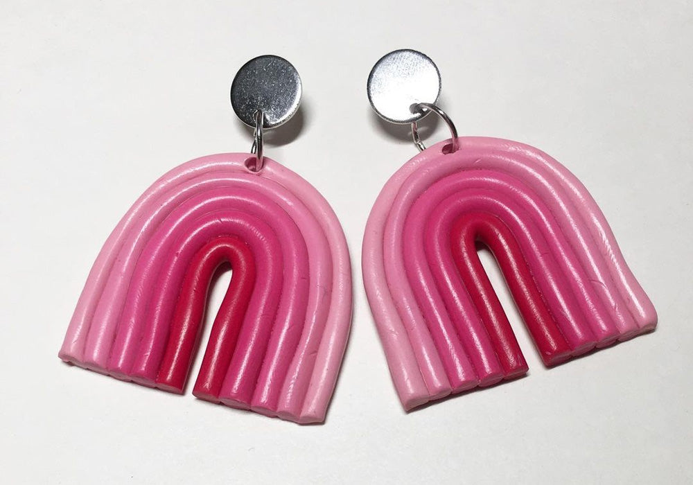 Pink ombre rainbow earrings.