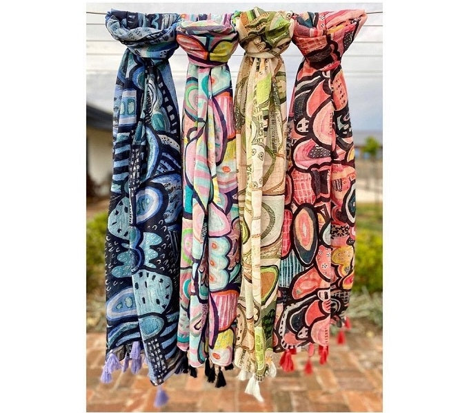 Art and fashion collaboration with scarves.