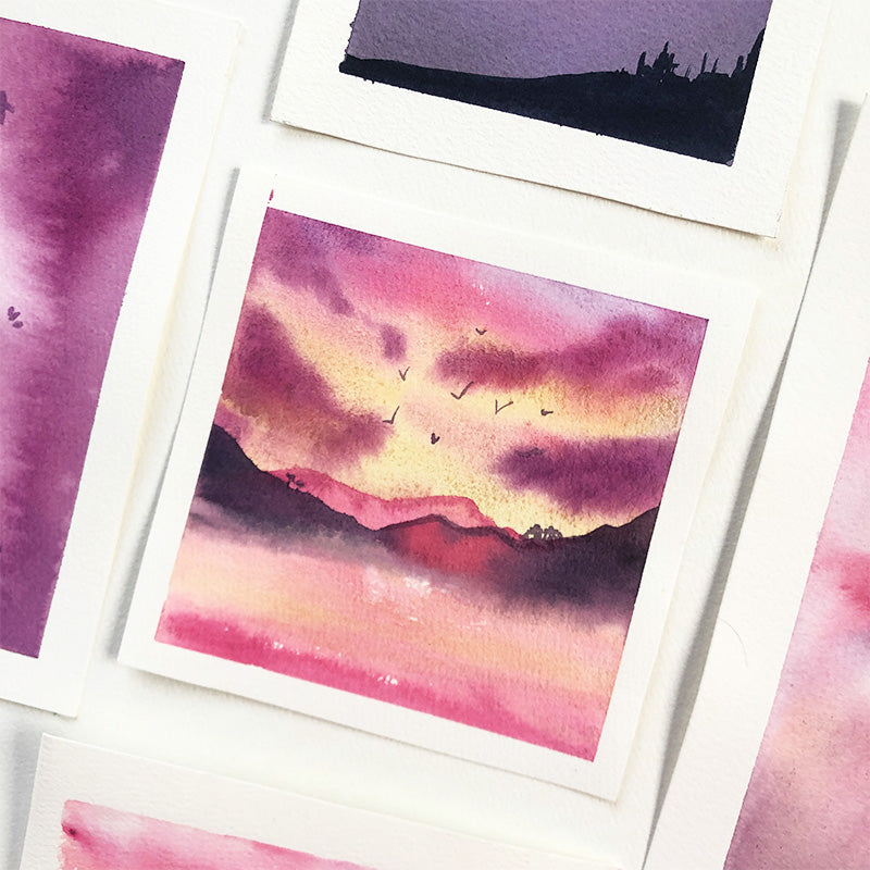 Pink and purple sunset watercolour painting of mountains