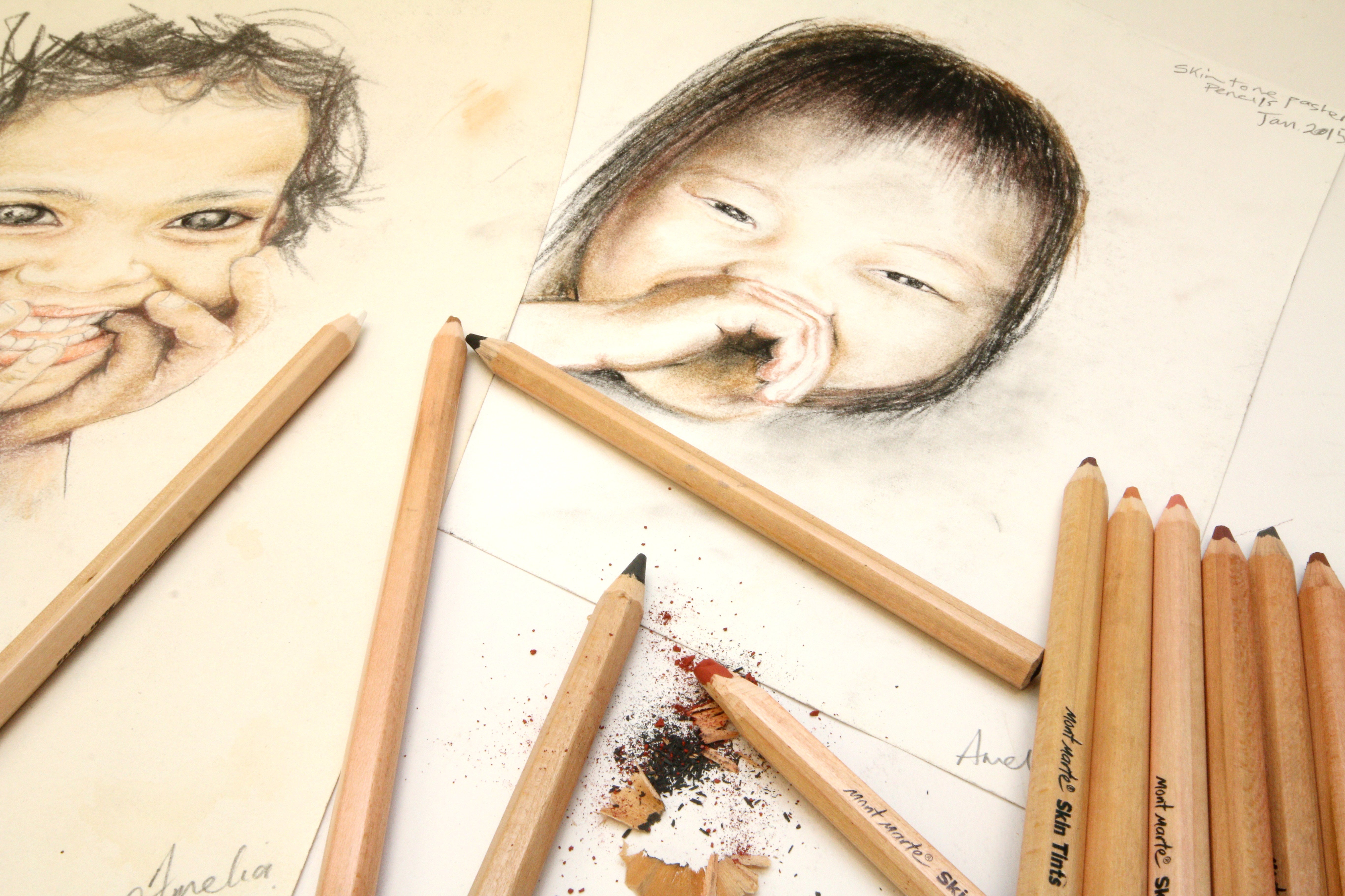 Portraiture drawing of two small children drawn using the Mont Marte skin tints pastel pencils.