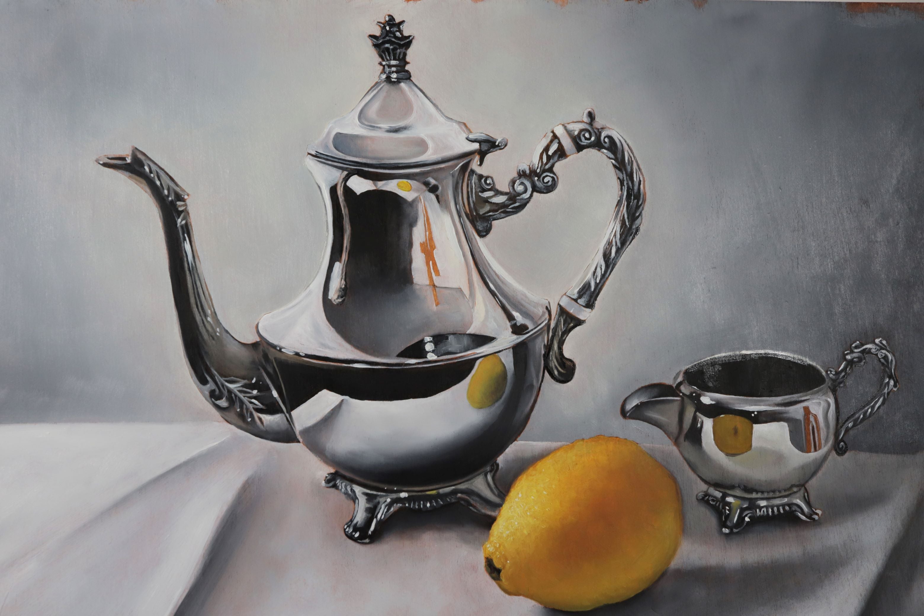 Still life painting of reflective jug and pot with lemon in foreground