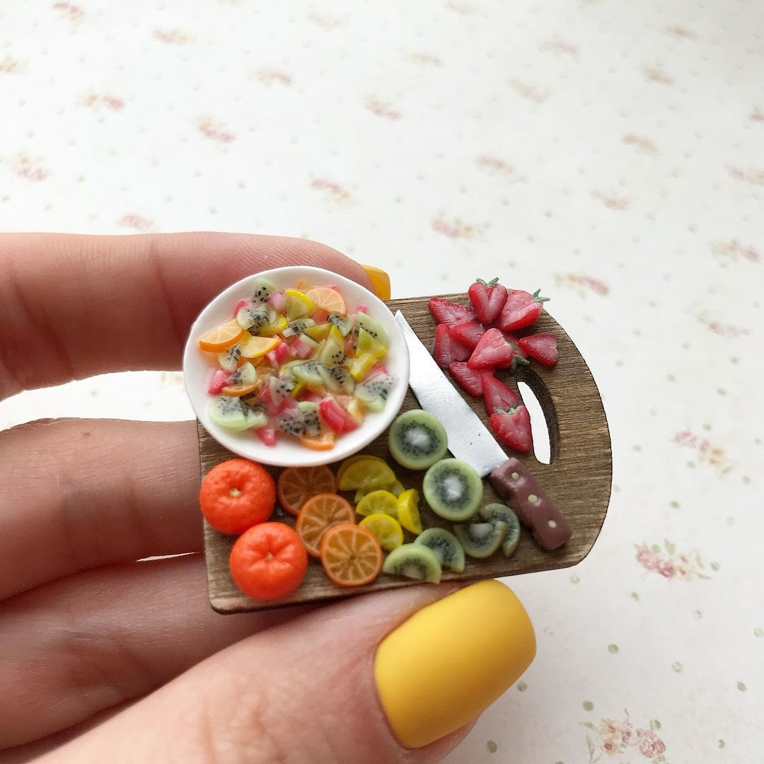 @nicecrumbsshop Miniature fruit salad on a platter made with polymer clay