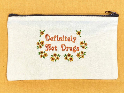 Orange definitely not drugs pouch