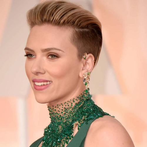 Scarlett Johansson wearing long solitaire dimaond earrings