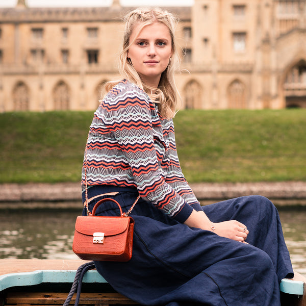 Orange croc Betty Bag worn cross body