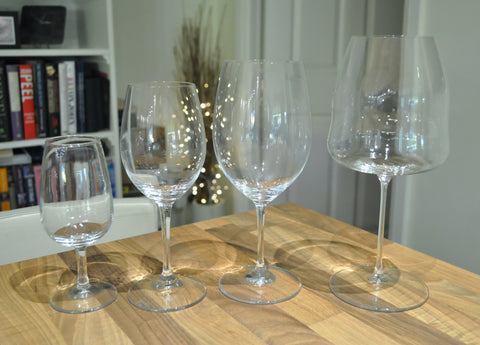 Different styles of glass for wine tasting