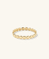 Gold Dot Ring with a circular design, ideal for stacking.