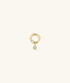 Celeste Lab Grown Diamond Ellipse Stud featuring prong-set diamonds and a bezel-set charm, designed to mimic star constellations, offering elegant movement.