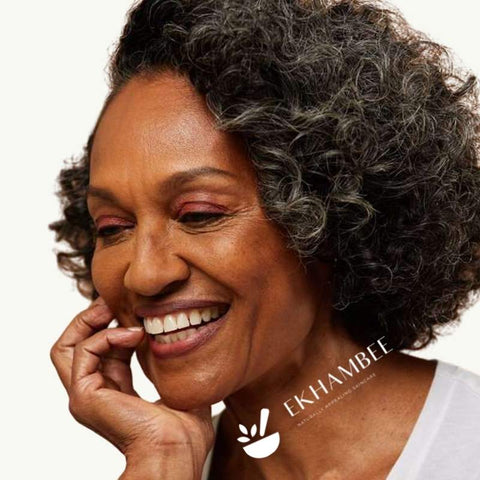 Black middle aged woman with Ekhambee logo