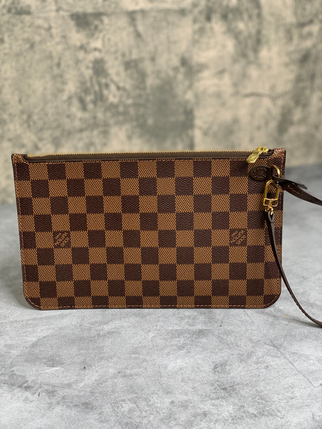 neverfull wristlet