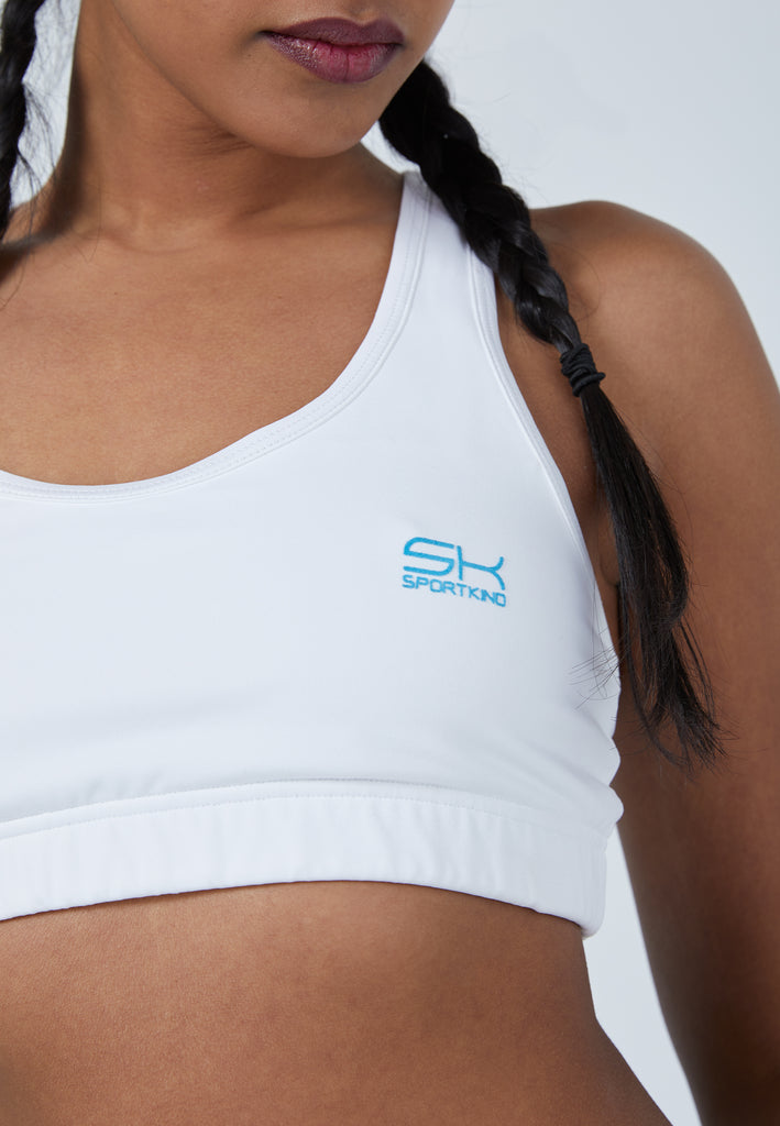 Sports bra with crossed straps in white for girls and women