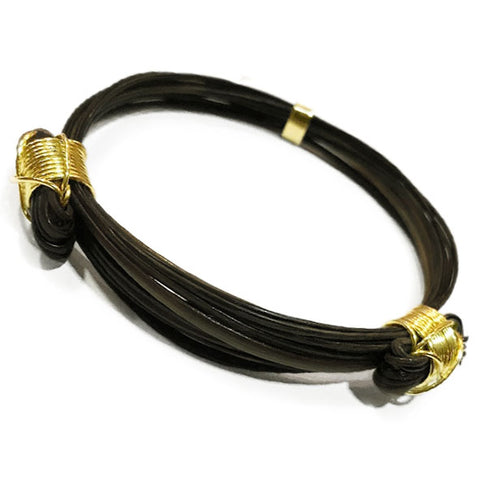 pulsera pelo bufalo nudos corredizos atado oro de ley