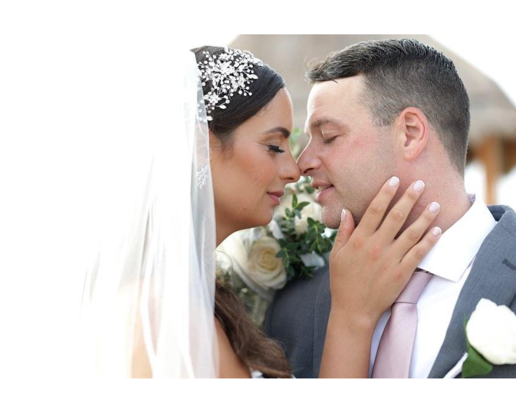 Beautiful bride Andrea with her new husband. She's wearing her hair down with a custom Swarovski crystal hair vine.