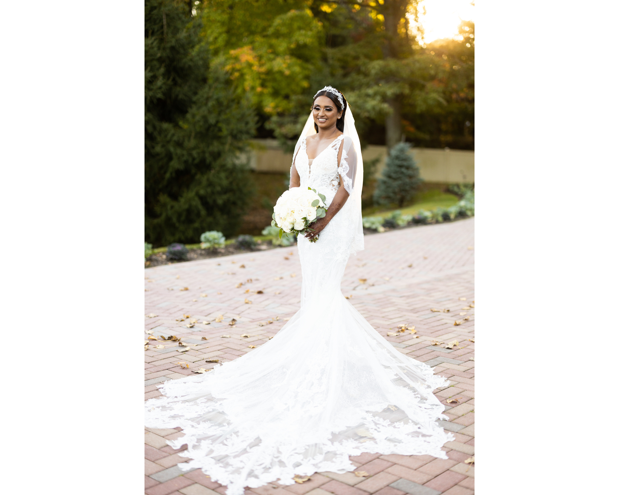Stunning bride Avita in her lace wedding gown, veil,  and Swarovski crystal headband!