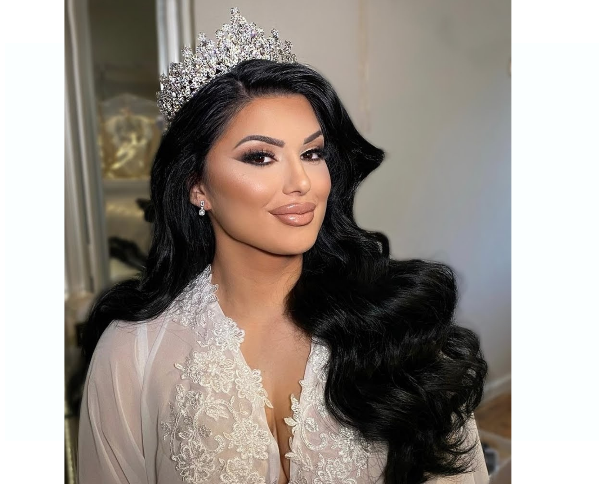 Our regal Bridal Styles Boutique bride wore her long hair in loose, romantic waves with a glittering crystal bridal tiara.