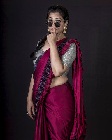Woman Wearing a Magenta Saree and Sunglasses