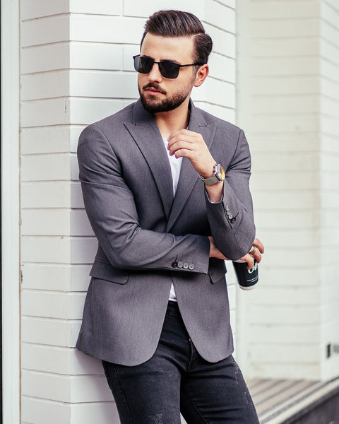 man in a smart casual look with dark sunglasses