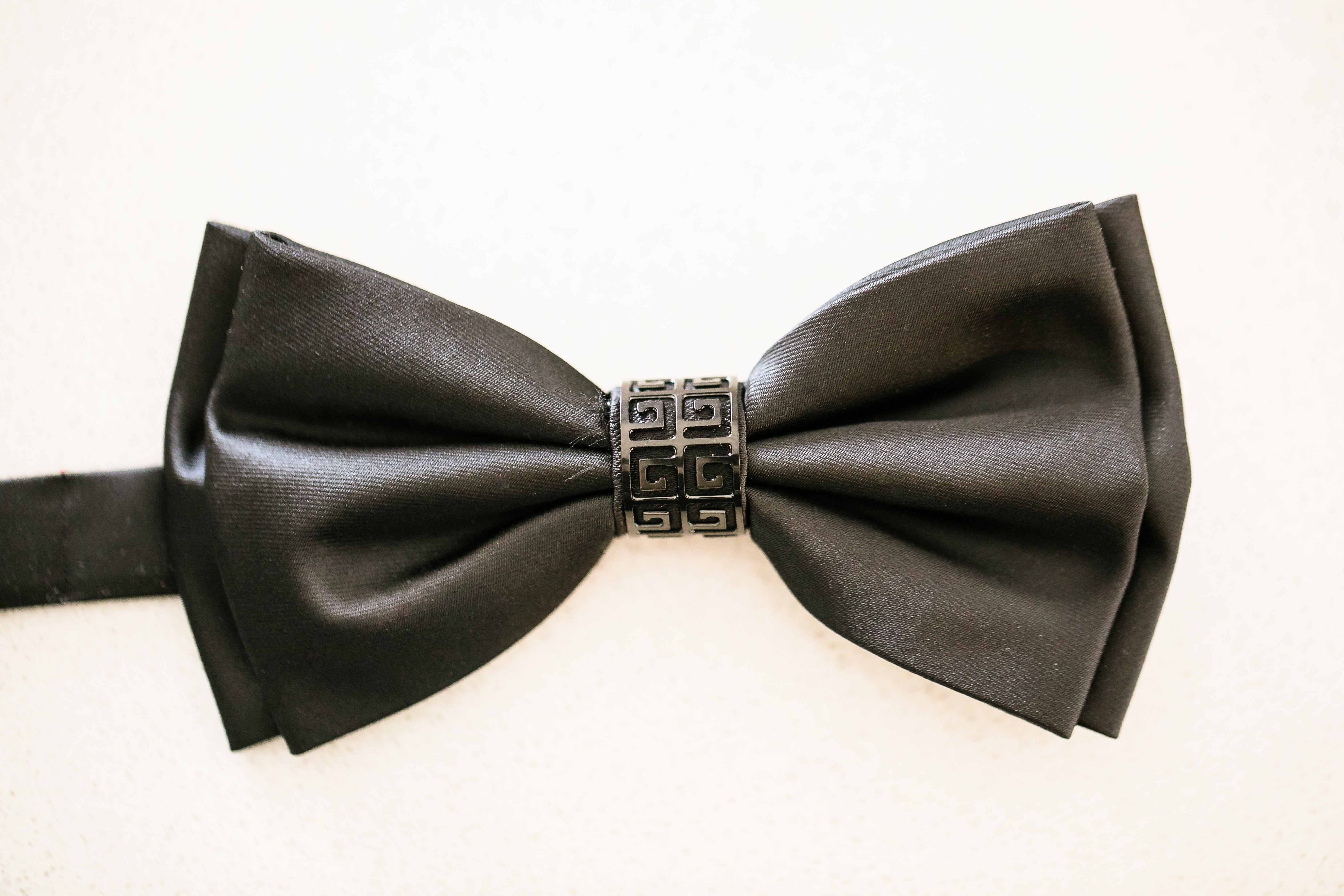 photo of a black silk bow tie