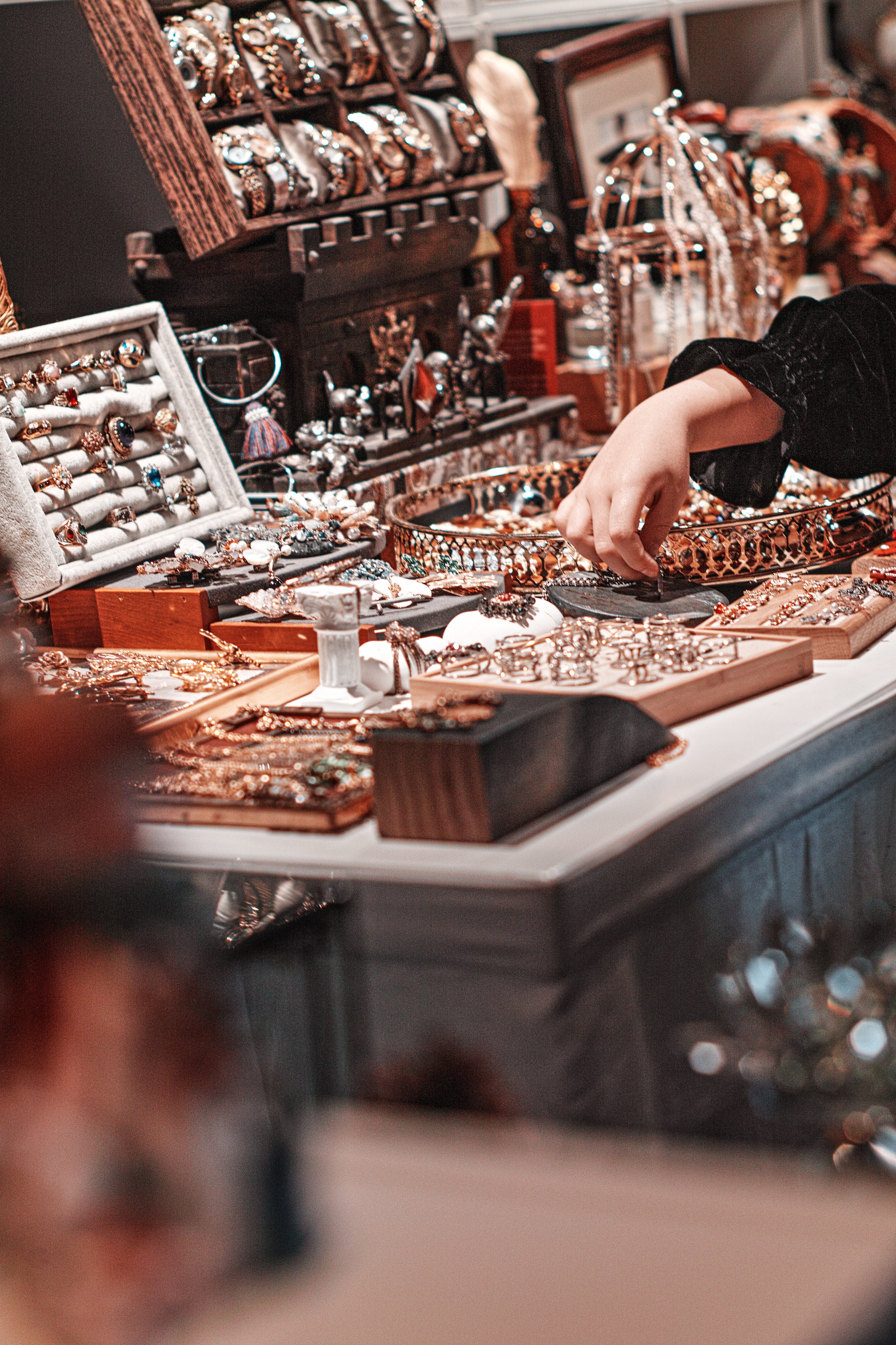 jewelry shop stall featuring different types of fashion jewelry