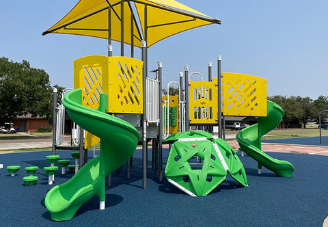 colorful playground with blue surfacing
