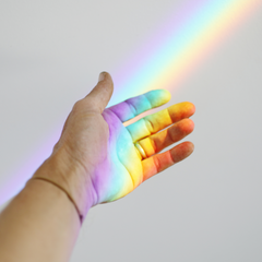 hand with rainbow