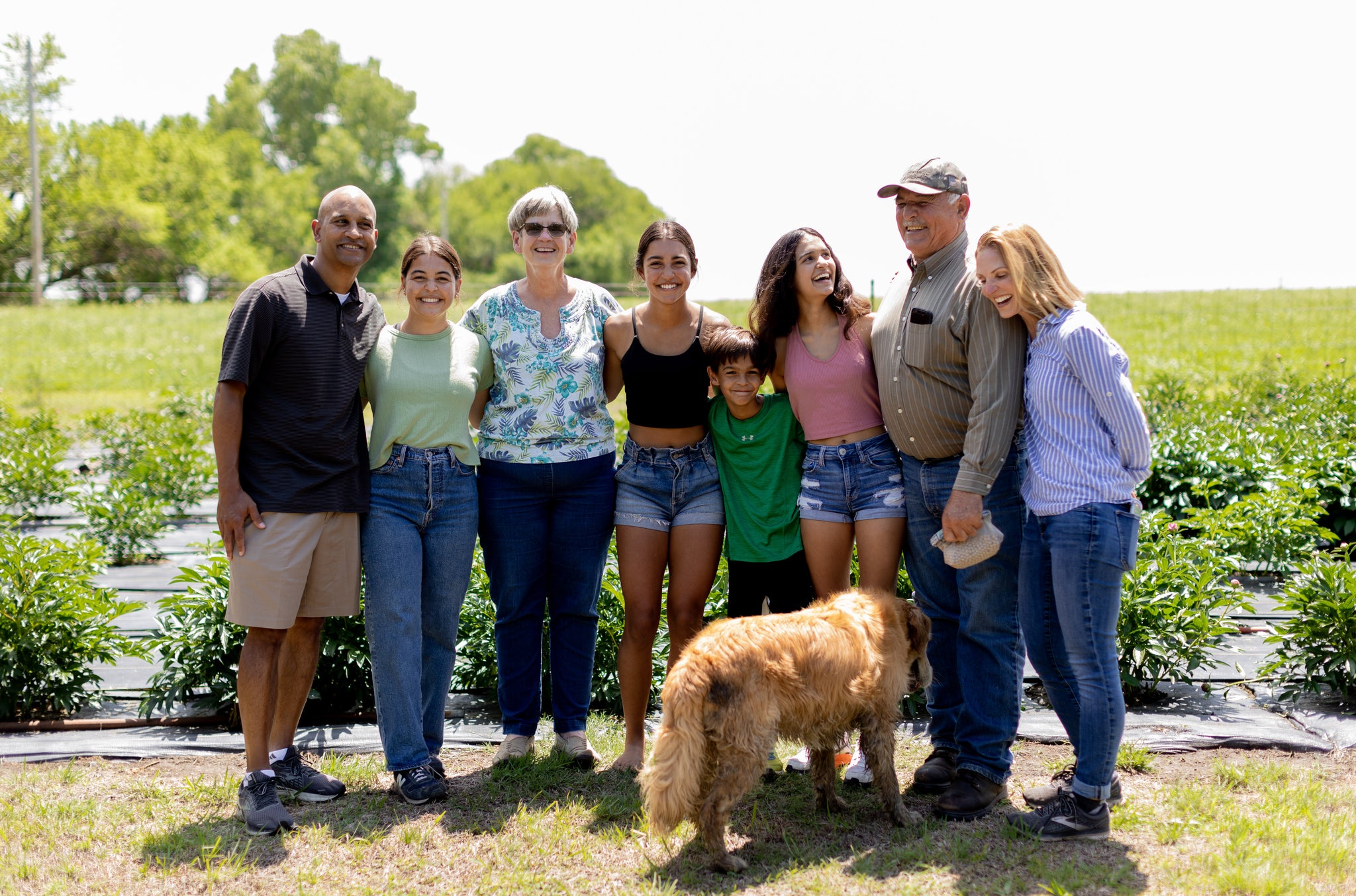 family photo in peony field