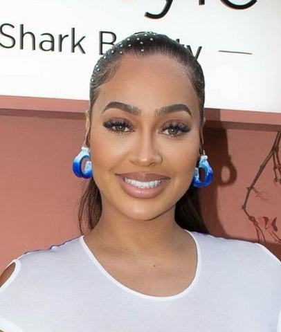 La La Anthony with a bedazzled ponytail