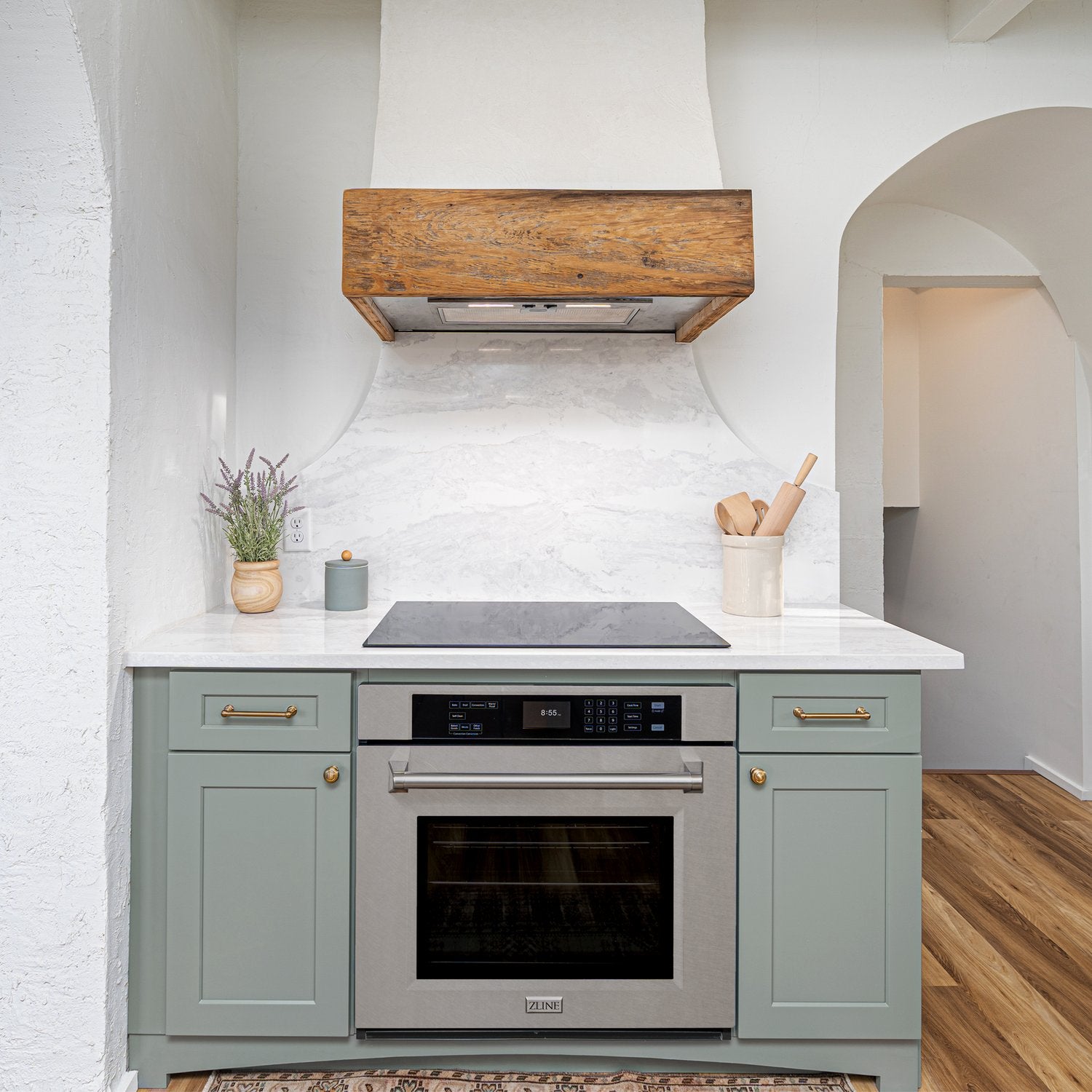 ZLINE single wall oven below an induction cooktop in a kitchenette