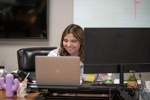 ZLINE staff member working at a desk