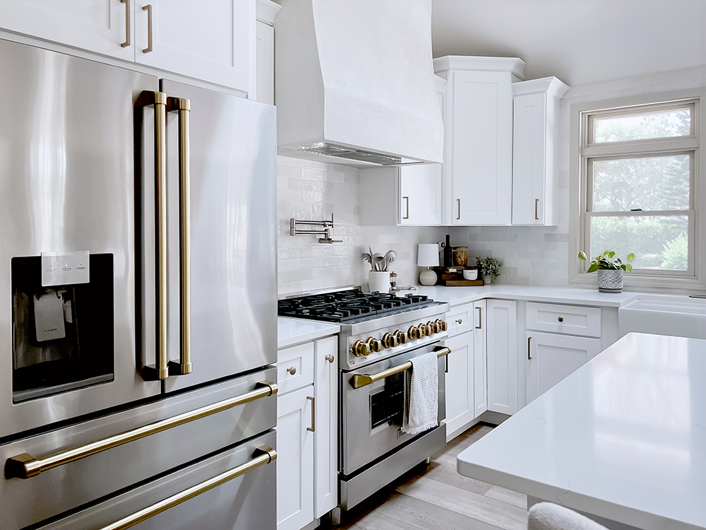 Close-up ZLINE Autograph Edition Refrigerator and Range in Amanda Vernaci's kitchen