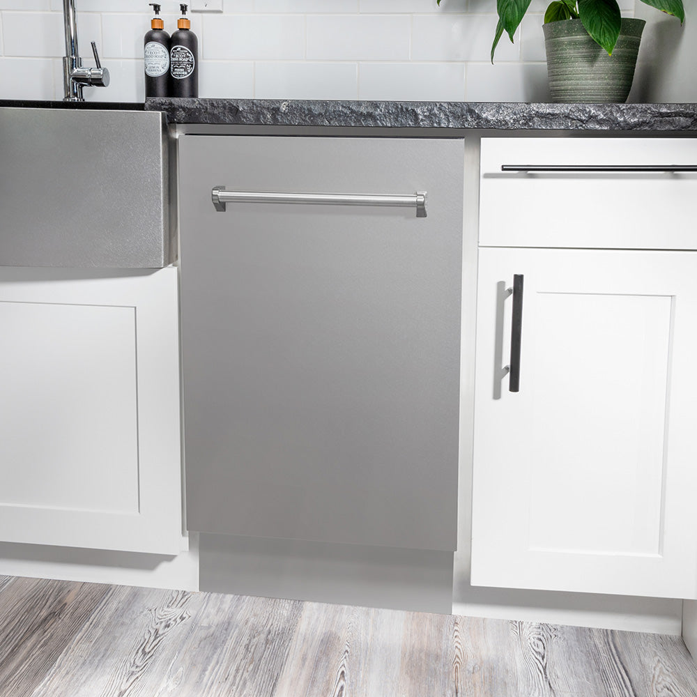 ZLINE Tallac dishwasher with a stainless steel panel built-in to white kitchen counters