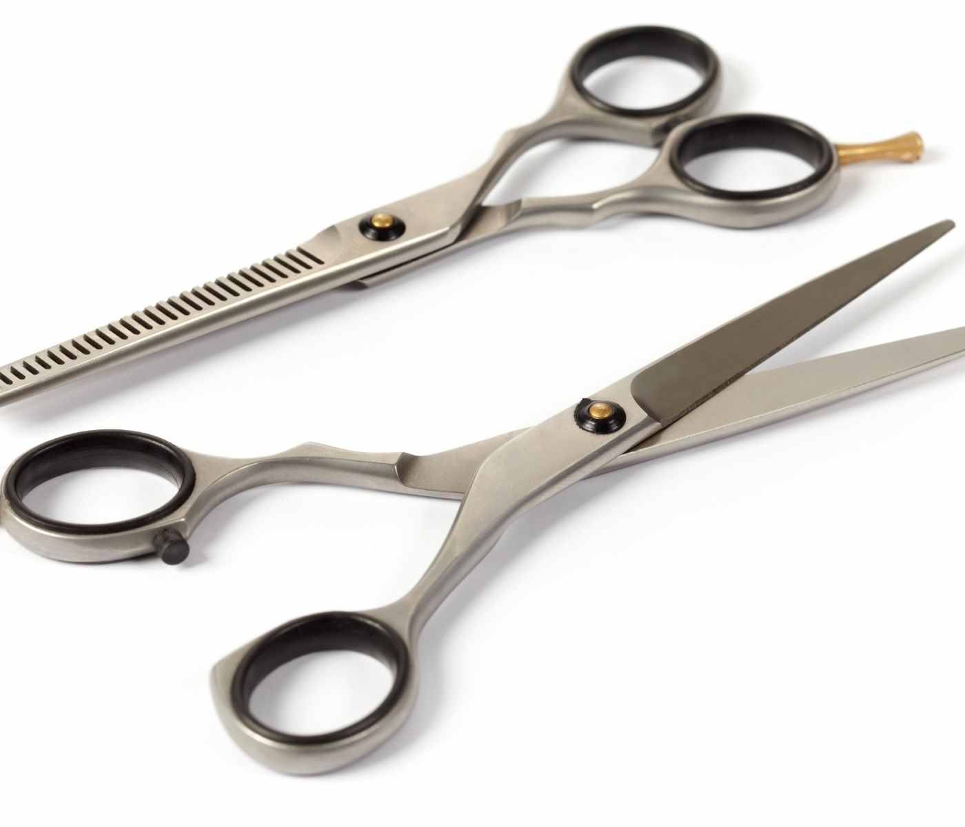 A close-up image showing the anatomy of hair scissors